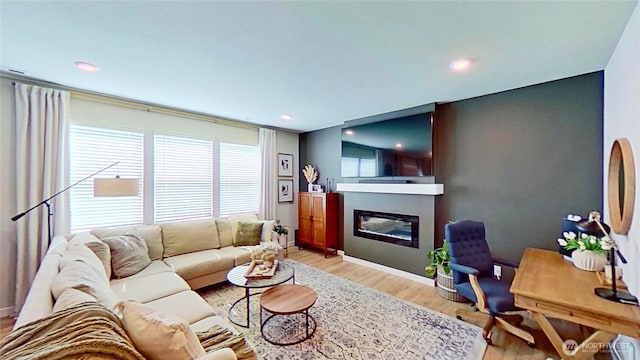 5845 Waverly Rd SW, Port Orchard, WA 98367 - living area featuring light wood-type flooring, a glass covered fireplace, and recessed lighting
