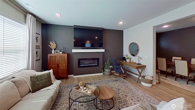 5845 Waverly Rd SW, Port Orchard, WA 98367 - living room with wood finished floors, a glass covered fireplace, and recessed lighting