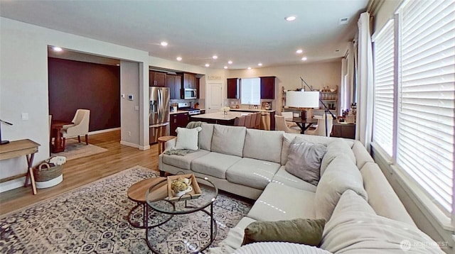 5845 Waverly Rd SW, Port Orchard, WA 98367 - living room featuring light wood-type flooring and recessed lighting