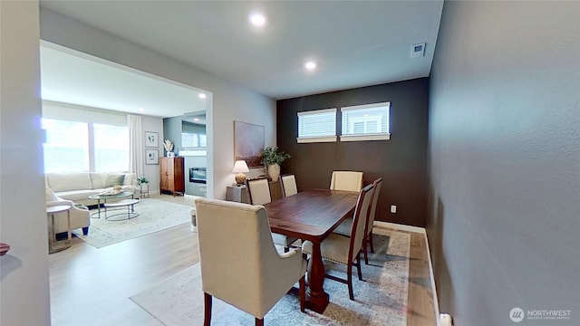 5845 Waverly Rd SW, Port Orchard, WA 98367 - dining area featuring recessed lighting, healthy amount of natural light, and wood finished floors