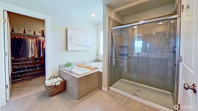 5845 Waverly Rd SW, Port Orchard, WA 98367 - bathroom featuring a garden tub, a shower stall, tile patterned flooring, a walk in closet, and recessed lighting