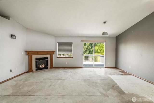 16411 156th St SE, Monroe, WA 98272 - unfurnished living room featuring baseboards and a tile fireplace