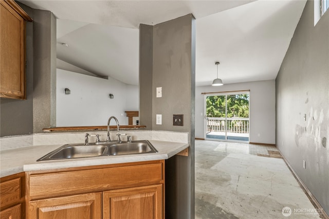 16411 156th St SE, Monroe, WA 98272 - kitchen featuring light countertops, brown cabinets, and lofted ceiling