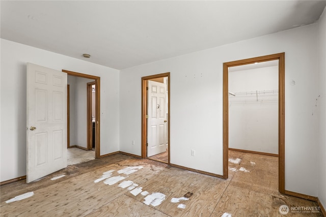 16411 156th St SE, Monroe, WA 98272 - unfurnished bedroom featuring a walk in closet and a closet