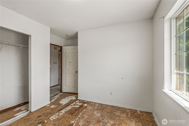 16411 156th St SE, Monroe, WA 98272 - unfurnished bedroom featuring a closet and baseboards