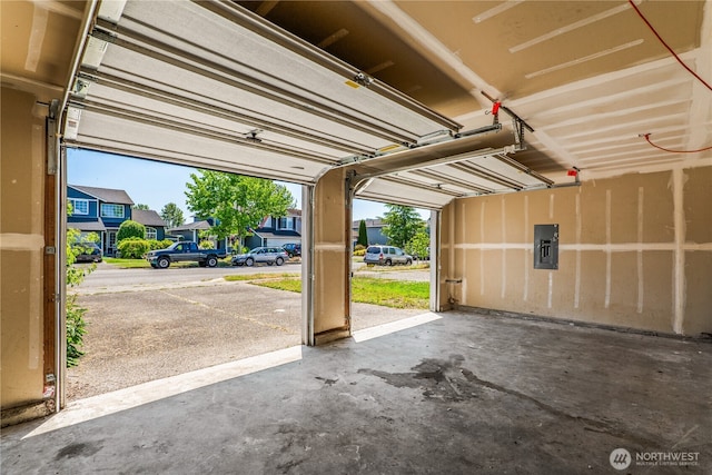 16411 156th St SE, Monroe, WA 98272 - garage featuring electric panel and a residential view