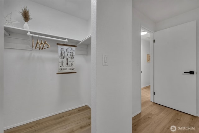 7040 SE Truman St, Port Orchard, WA 98366 - walk in closet with wood finished floors