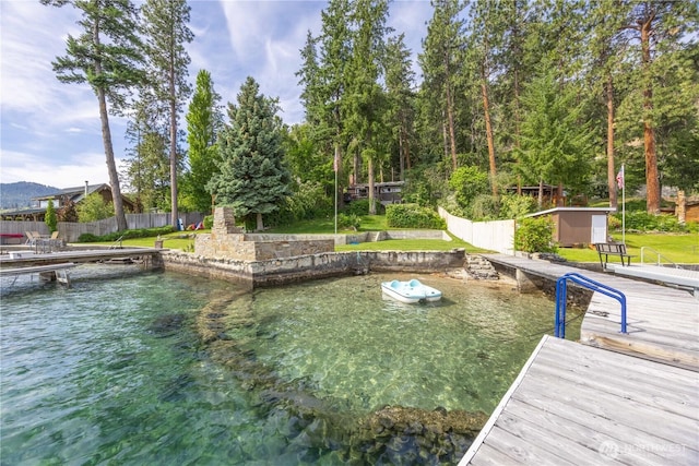 9368 S Lakeshore Rd, Chelan, WA 98816 - dock featuring a yard and a water view