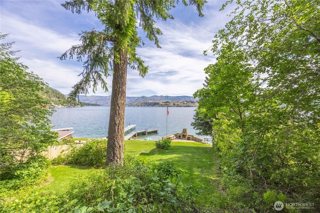 9368 S Lakeshore Rd, Chelan, WA 98816 - water view with a boat dock and a mountain backdrop