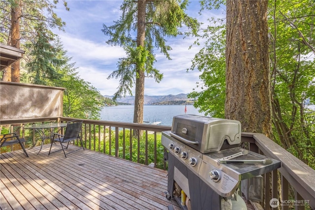 9368 S Lakeshore Rd, Chelan, WA 98816 - wooden terrace featuring a water and mountain view and a grill