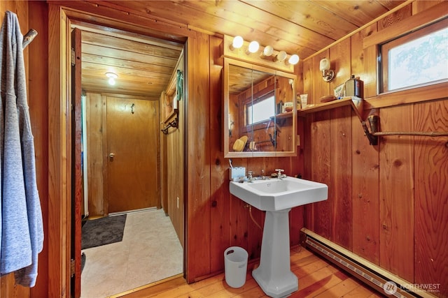 9368 S Lakeshore Rd, Chelan, WA 98816 - bathroom featuring a baseboard heating unit, wood walls, wood ceiling, and wood finished floors