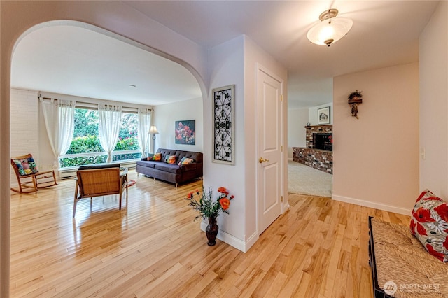 141 Leslie Ln, Sequim, WA 98382 - hall with arched walkways and light wood finished floors