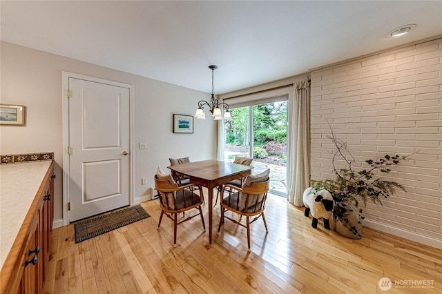 141 Leslie Ln, Sequim, WA 98382 - dining room with light wood-type flooring and a chandelier