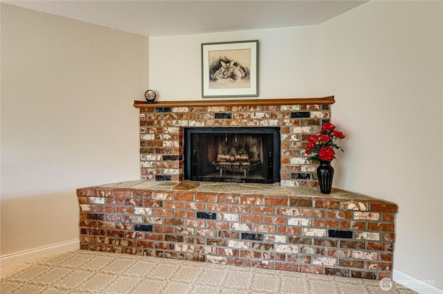 141 Leslie Ln, Sequim, WA 98382 - detailed view of baseboards and a brick fireplace