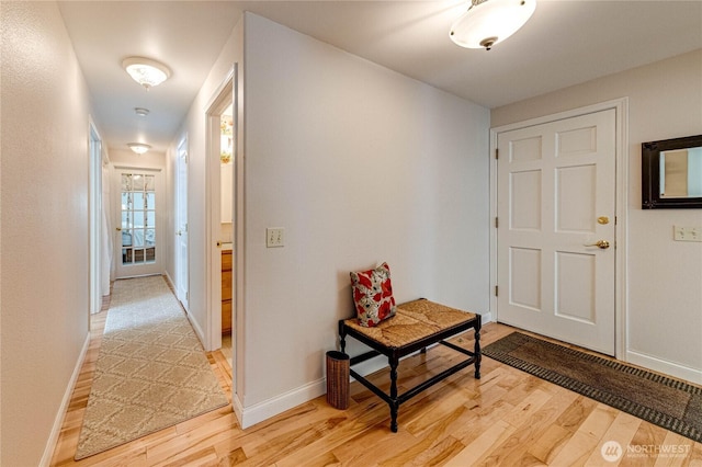 141 Leslie Ln, Sequim, WA 98382 - hallway with light wood-style floors and baseboards
