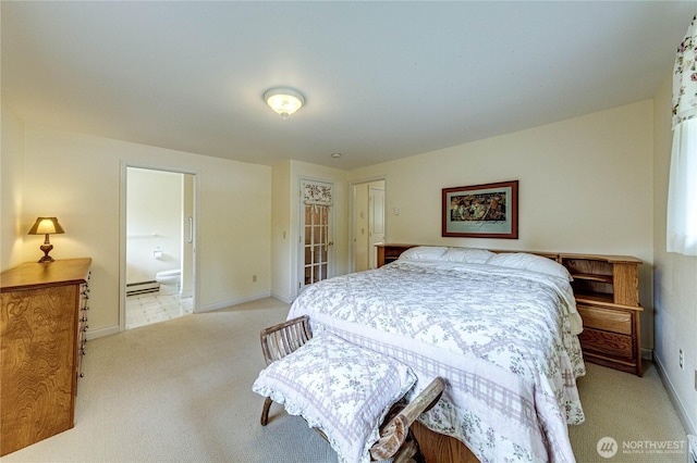 141 Leslie Ln, Sequim, WA 98382 - bedroom featuring light carpet, a baseboard radiator, and connected bathroom