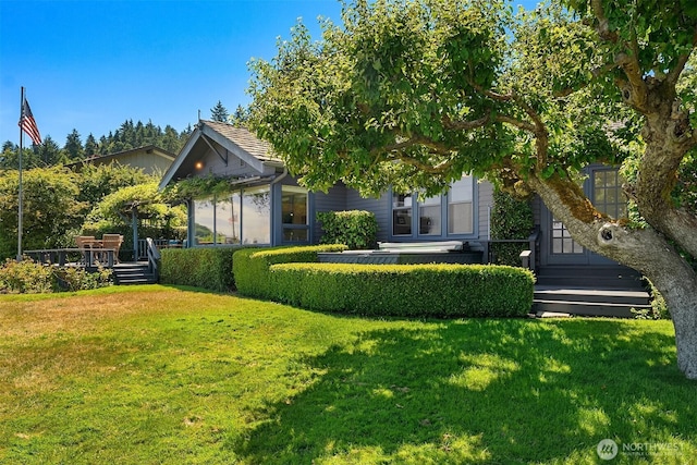 14504 Glen Acres Rd, Vashon, WA 98070 - view of front facade featuring a front lawn and a wooden deck