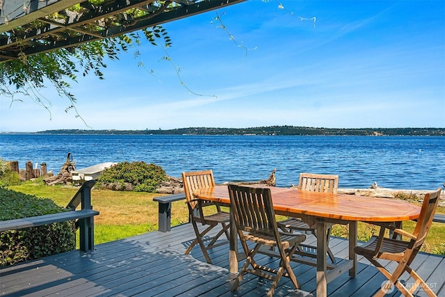 14504 Glen Acres Rd, Vashon, WA 98070 - wooden deck featuring a water view and outdoor dining space
