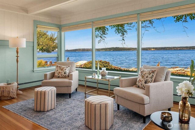 14504 Glen Acres Rd, Vashon, WA 98070 - sunroom / solarium with a baseboard heating unit, wood finished floors, a water view, and beam ceiling
