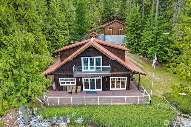15320 Cedar Brae, Leavenworth, WA 98826 - rear view of property featuring a deck, a wooded view, and french doors