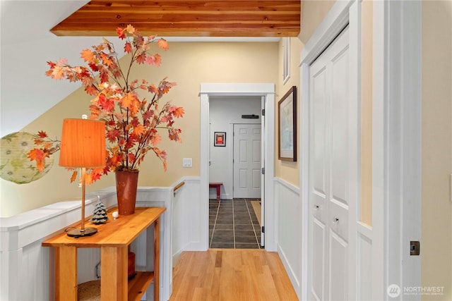 15320 Cedar Brae, Leavenworth, WA 98826 - hallway featuring a wainscoted wall and wood finished floors