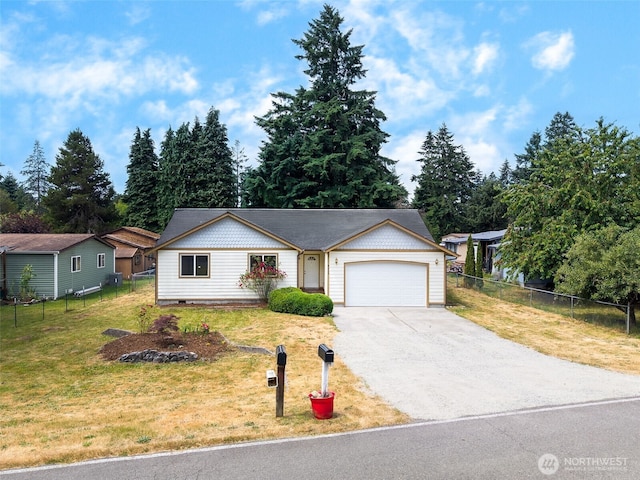 8537 Thuja Ave SE, Yelm, WA 98597 - single story home featuring an attached garage and asphalt driveway
