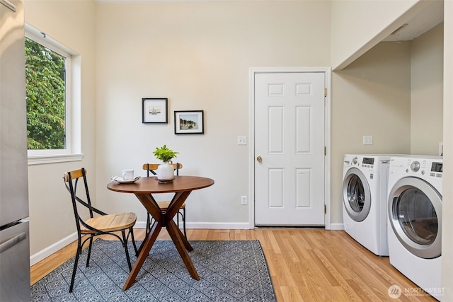 8537 Thuja Ave SE, Yelm, WA 98597 - laundry room featuring light wood-type flooring and washer and dryer