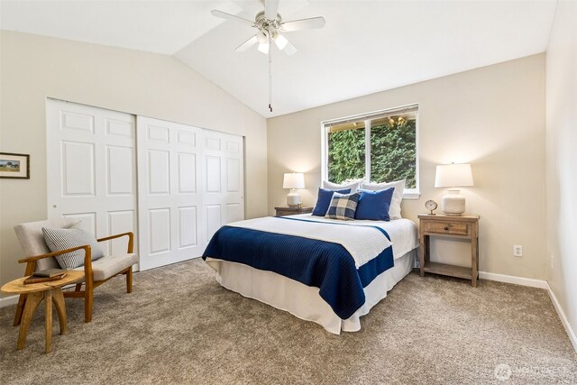 8537 Thuja Ave SE, Yelm, WA 98597 - bedroom featuring a closet, vaulted ceiling, light colored carpet, and a ceiling fan
