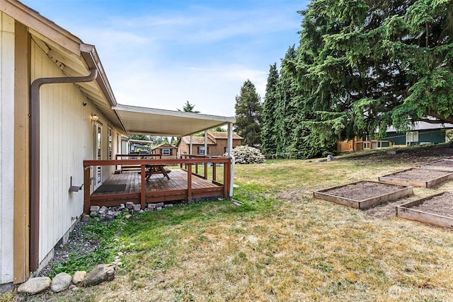8537 Thuja Ave SE, Yelm, WA 98597 - view of yard with a garden and a wooden deck