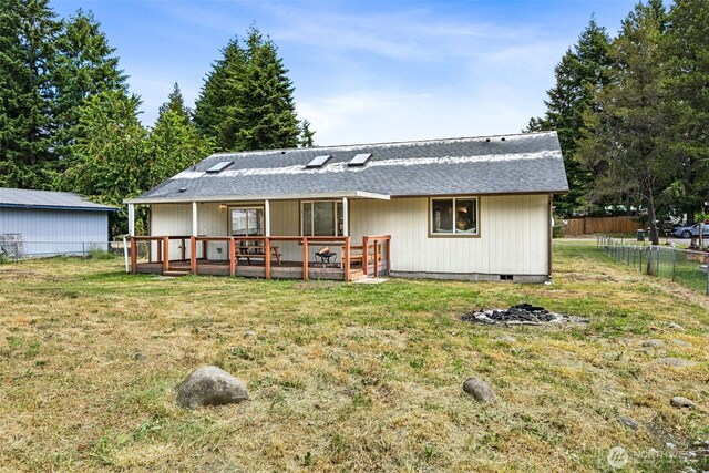 8537 Thuja Ave SE, Yelm, WA 98597 - rear view of property with a wooden deck, roof with shingles, and crawl space