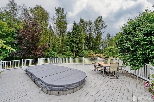 5679 W 31st Crst, Ferndale, WA 98248 - wooden terrace featuring a covered hot tub and outdoor dining area