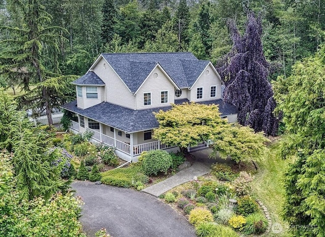 5679 W 31st Crst, Ferndale, WA 98248 - aerial view of property and surrounding area featuring a heavily wooded area