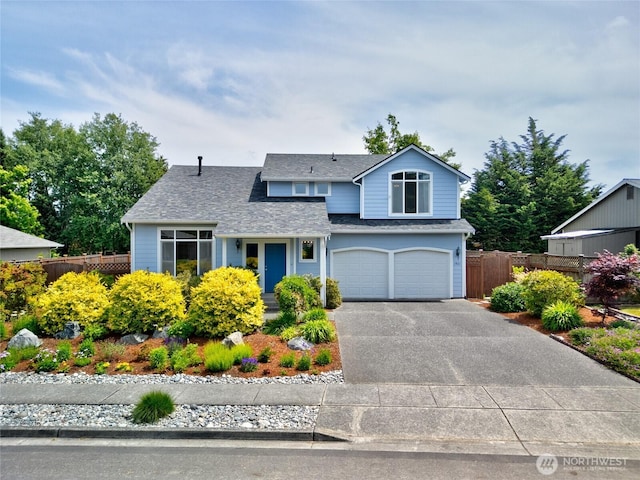 3401 F Ave, Anacortes, WA 98221 - traditional-style house featuring a garage, asphalt driveway, and roof with shingles