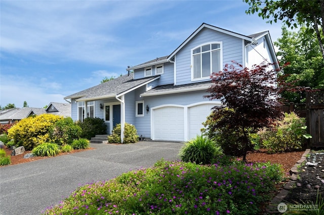 3401 F Ave, Anacortes, WA 98221 - view of front of home with a shingled roof, asphalt driveway, and a garage