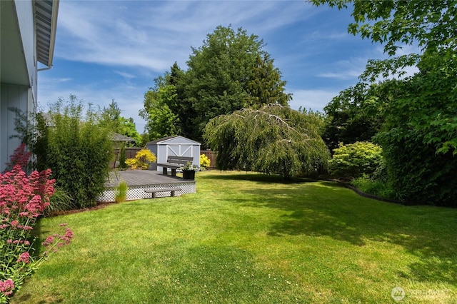 3401 F Ave, Anacortes, WA 98221 - view of yard featuring a storage shed and a wooden deck
