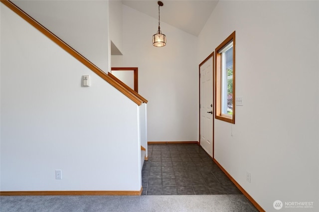 3401 F Ave, Anacortes, WA 98221 - carpeted entryway featuring vaulted ceiling and stairs