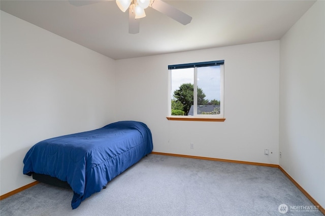 3401 F Ave, Anacortes, WA 98221 - carpeted bedroom featuring baseboards and a ceiling fan