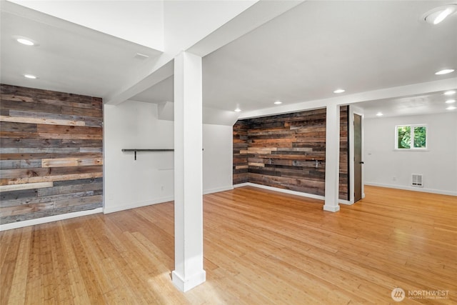 10746 Densmore Ave N, Seattle, WA 98133 - basement featuring wood walls, light wood-type flooring, and recessed lighting