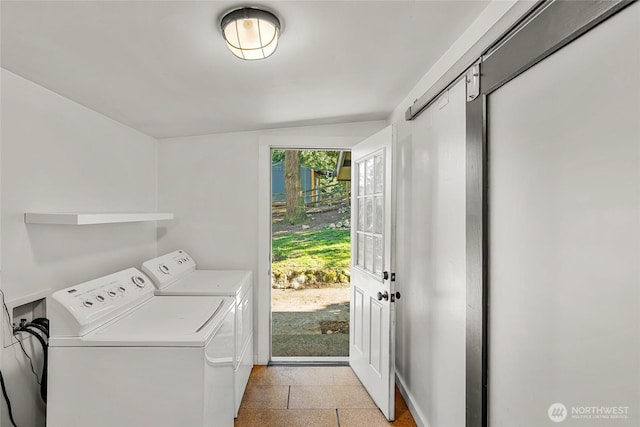 10746 Densmore Ave N, Seattle, WA 98133 - laundry area featuring washer and clothes dryer and baseboards