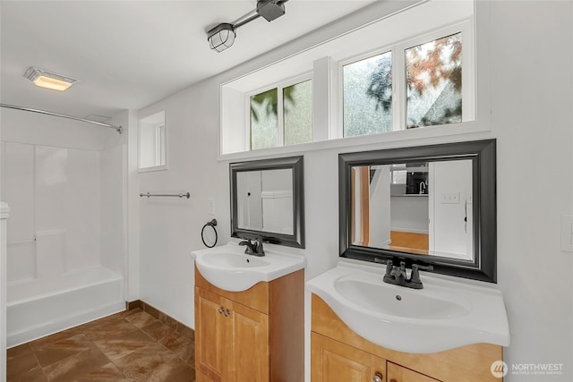 10746 Densmore Ave N, Seattle, WA 98133 - full bathroom with two vanities and shower / washtub combination