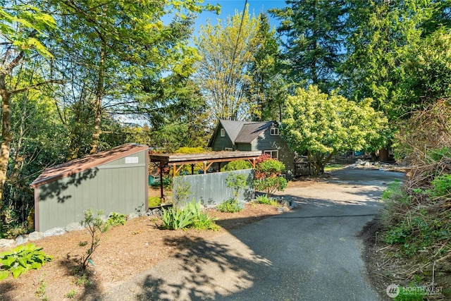 10746 Densmore Ave N, Seattle, WA 98133 - view of yard with asphalt driveway