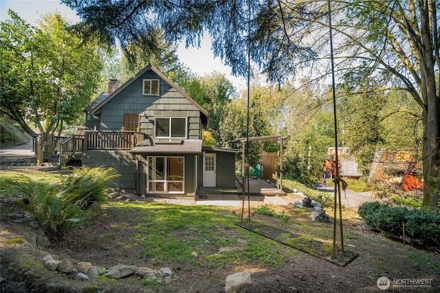 10746 Densmore Ave N, Seattle, WA 98133 - back of property featuring a deck and a chimney