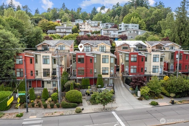 7747 Sand Point Way NE Unit A, Seattle, WA 98115 - view of building exterior with a residential view