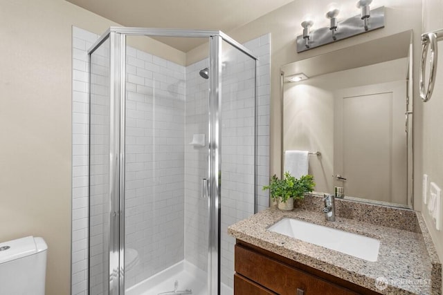 7747 Sand Point Way NE Unit A, Seattle, WA 98115 - bathroom featuring vanity and a stall shower