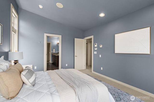 7747 Sand Point Way NE Unit A, Seattle, WA 98115 - carpeted bedroom with recessed lighting and ensuite bath