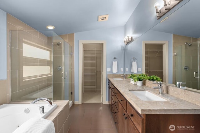 7747 Sand Point Way NE Unit A, Seattle, WA 98115 - bathroom with double vanity, a stall shower, and a spacious closet