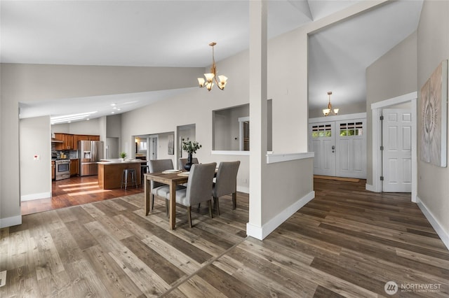 12712 232nd Ave E, Buckley, WA 98321 - dining room with high vaulted ceiling, a chandelier, and dark wood finished floors