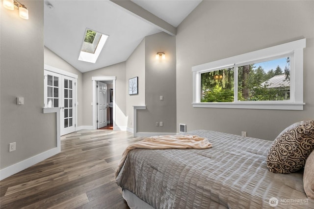 12712 232nd Ave E, Buckley, WA 98321 - bedroom featuring a skylight and wood finished floors