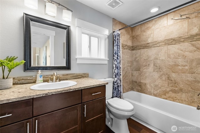 12712 232nd Ave E, Buckley, WA 98321 - full bathroom featuring vanity, shower / bath combo, and wood finished floors