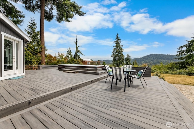 12712 232nd Ave E, Buckley, WA 98321 - deck featuring a mountain view and outdoor dining space